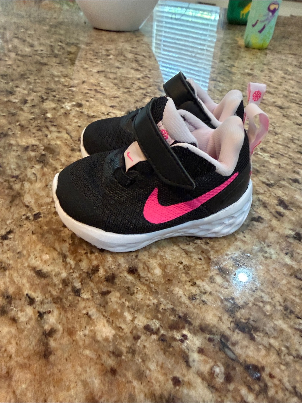 Nike Kids Black Sneakers with Pink Swoosh
